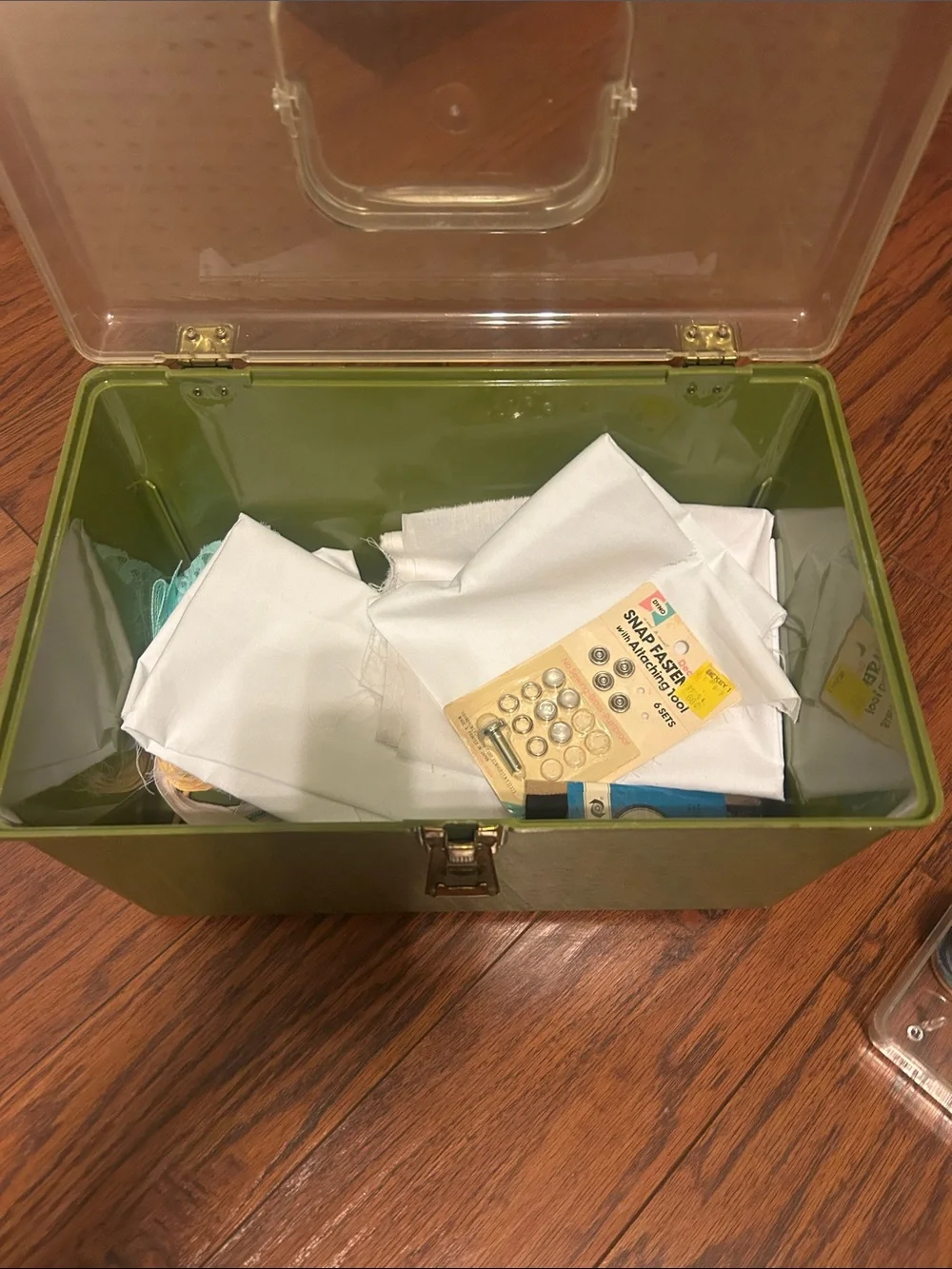 Vgt Olive Green sewing Box with Clear Lid w all contents shown.